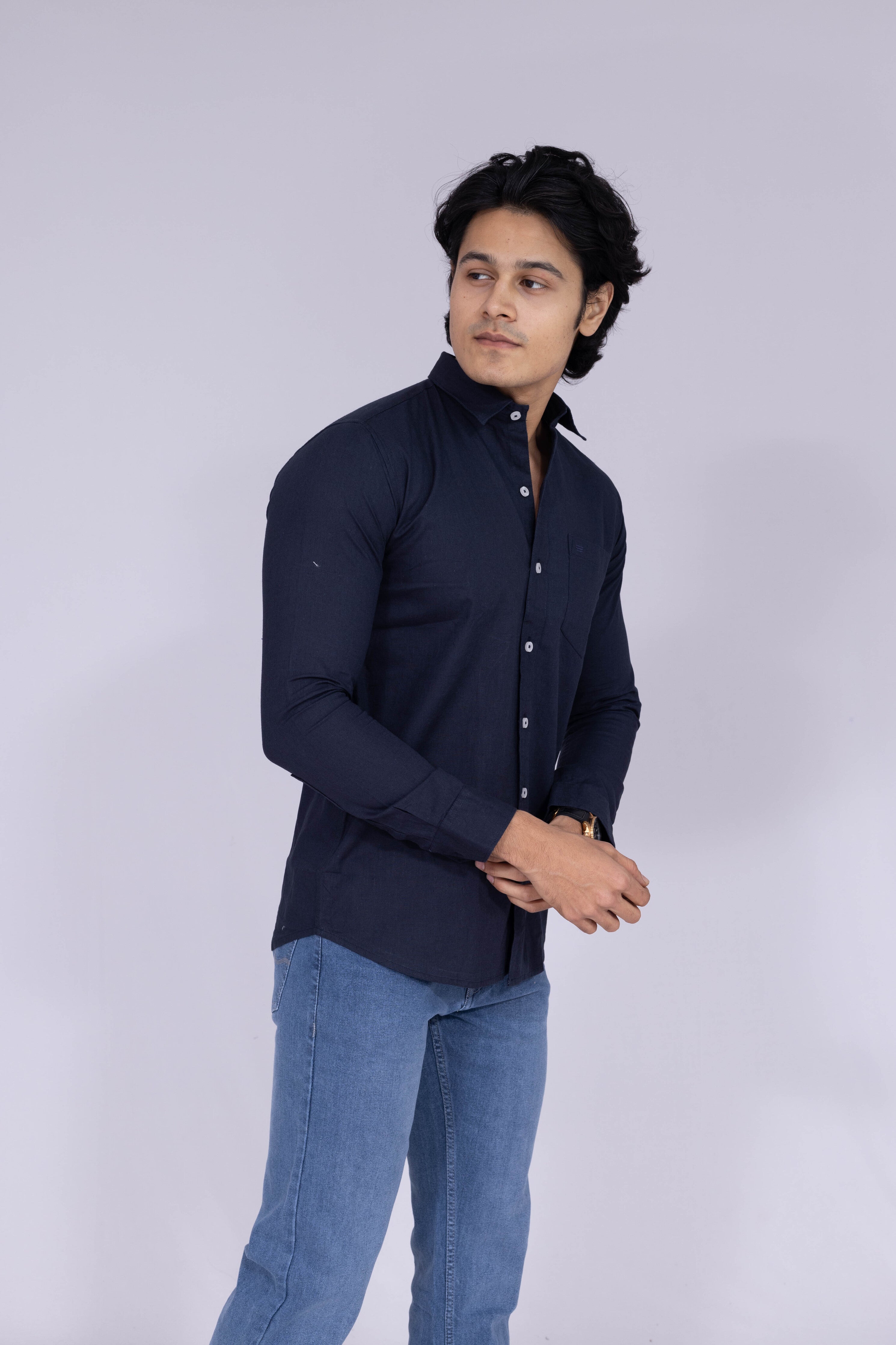 Classic navy blue solid shirt with white buttons